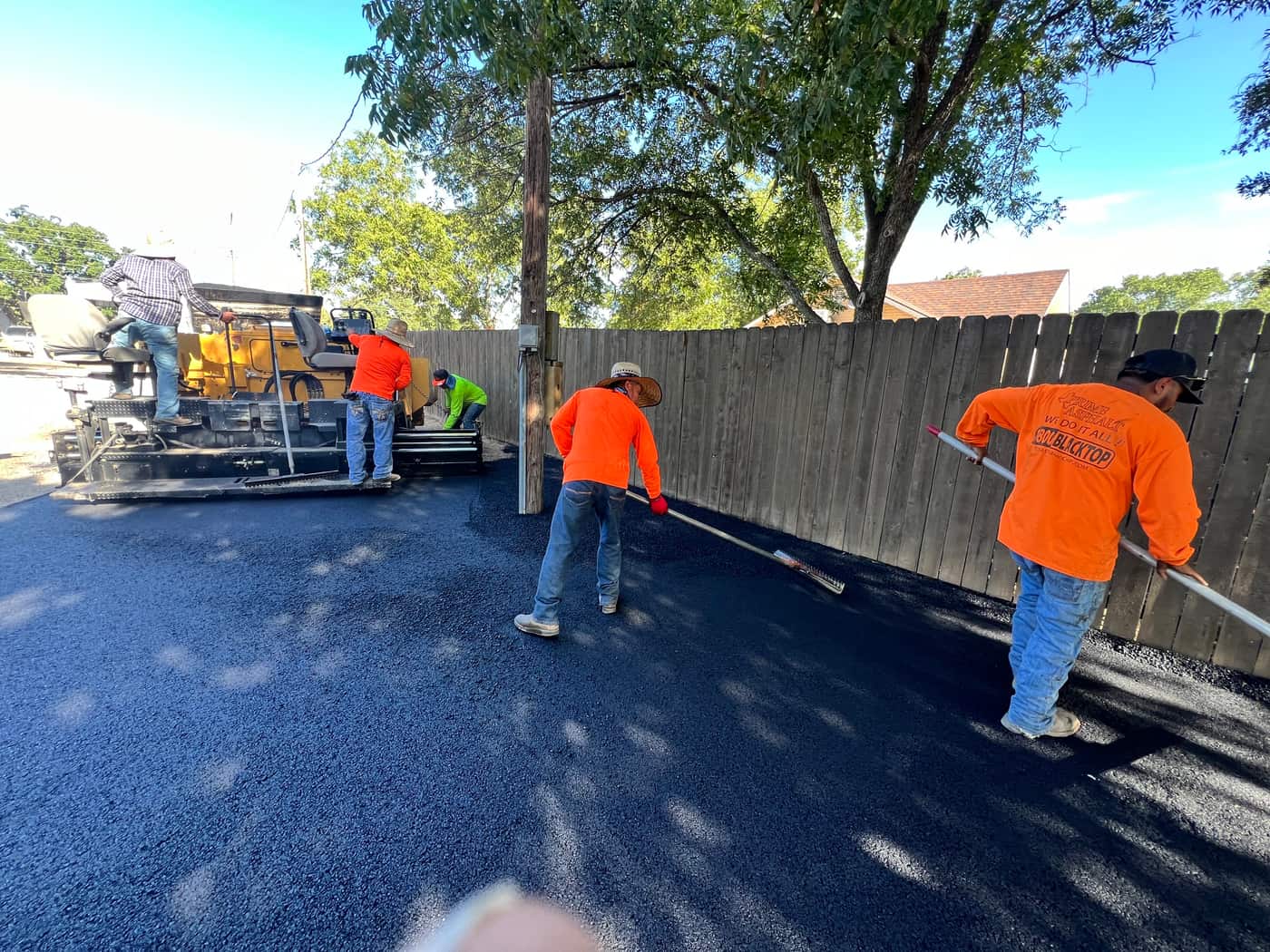 Interstate Asphalt of Washington crew at work on a Seattle driveway