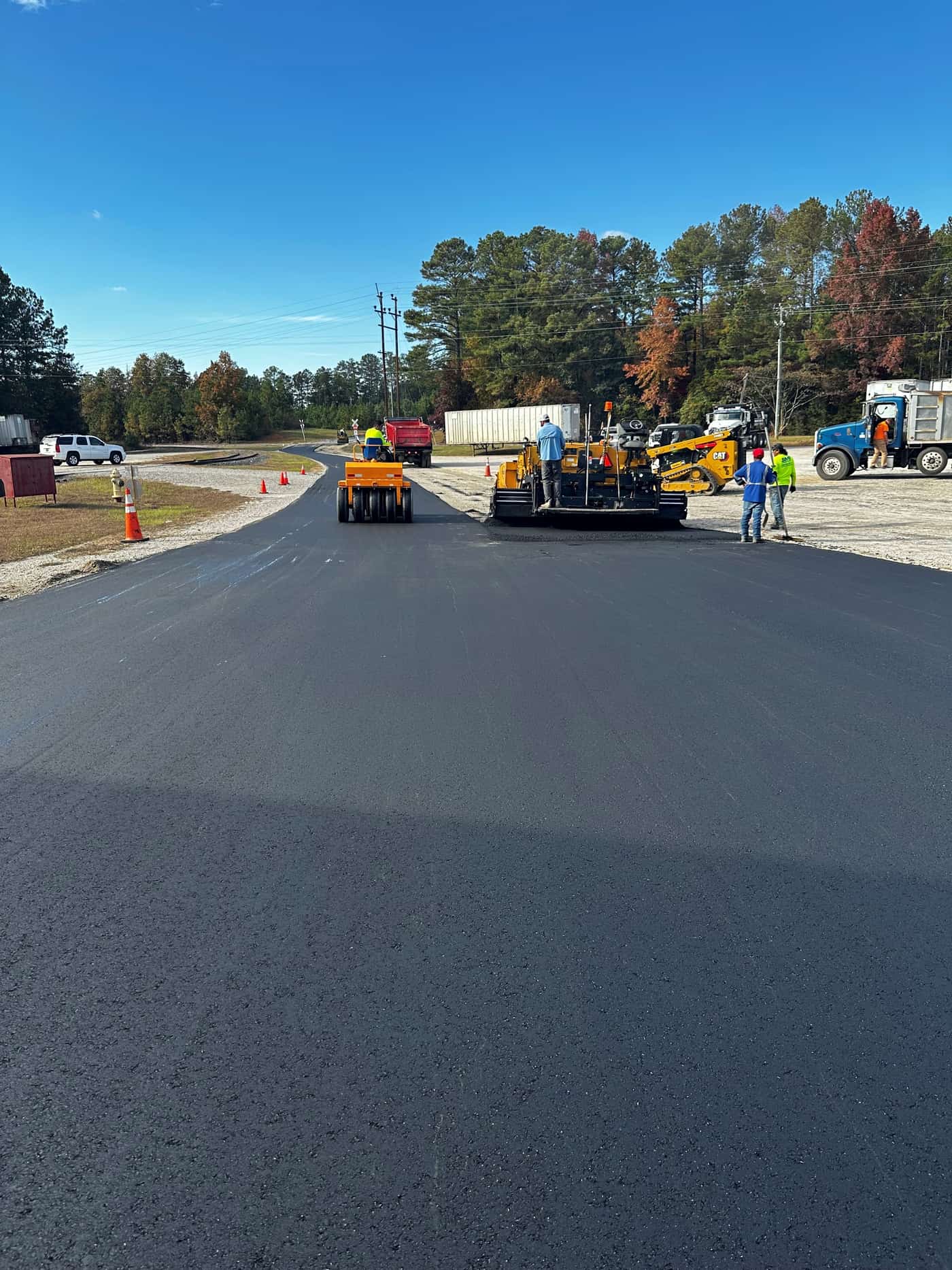 Interstate Asphalt of Washington crew laying hot mix on a Seattle driveway